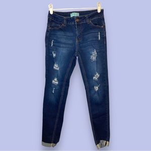 Ripped blue skinny jeans